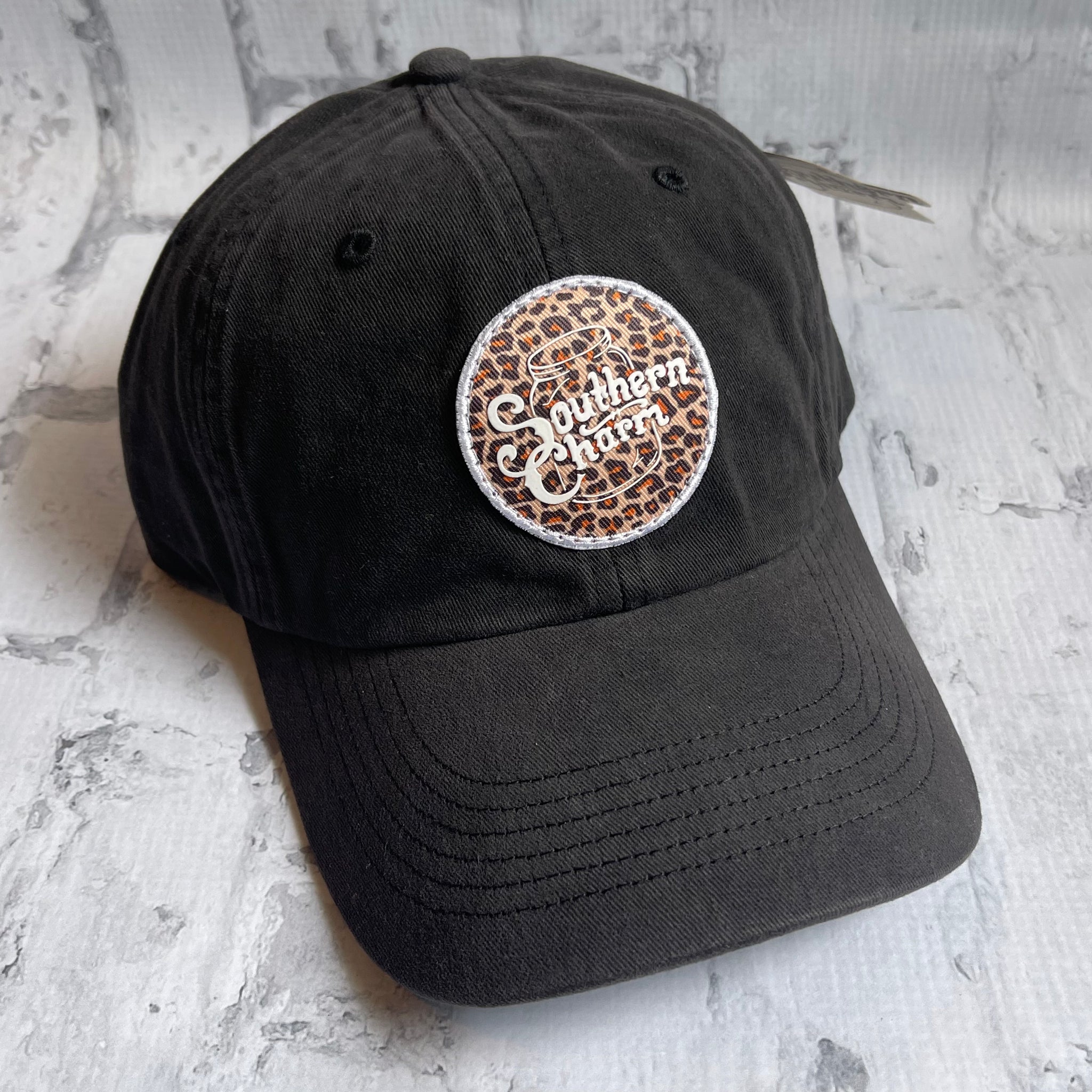 Southern Charm "Cheetah Circle" Hat - Black with Woven Patch - Southern Charm "Shop The Charm"