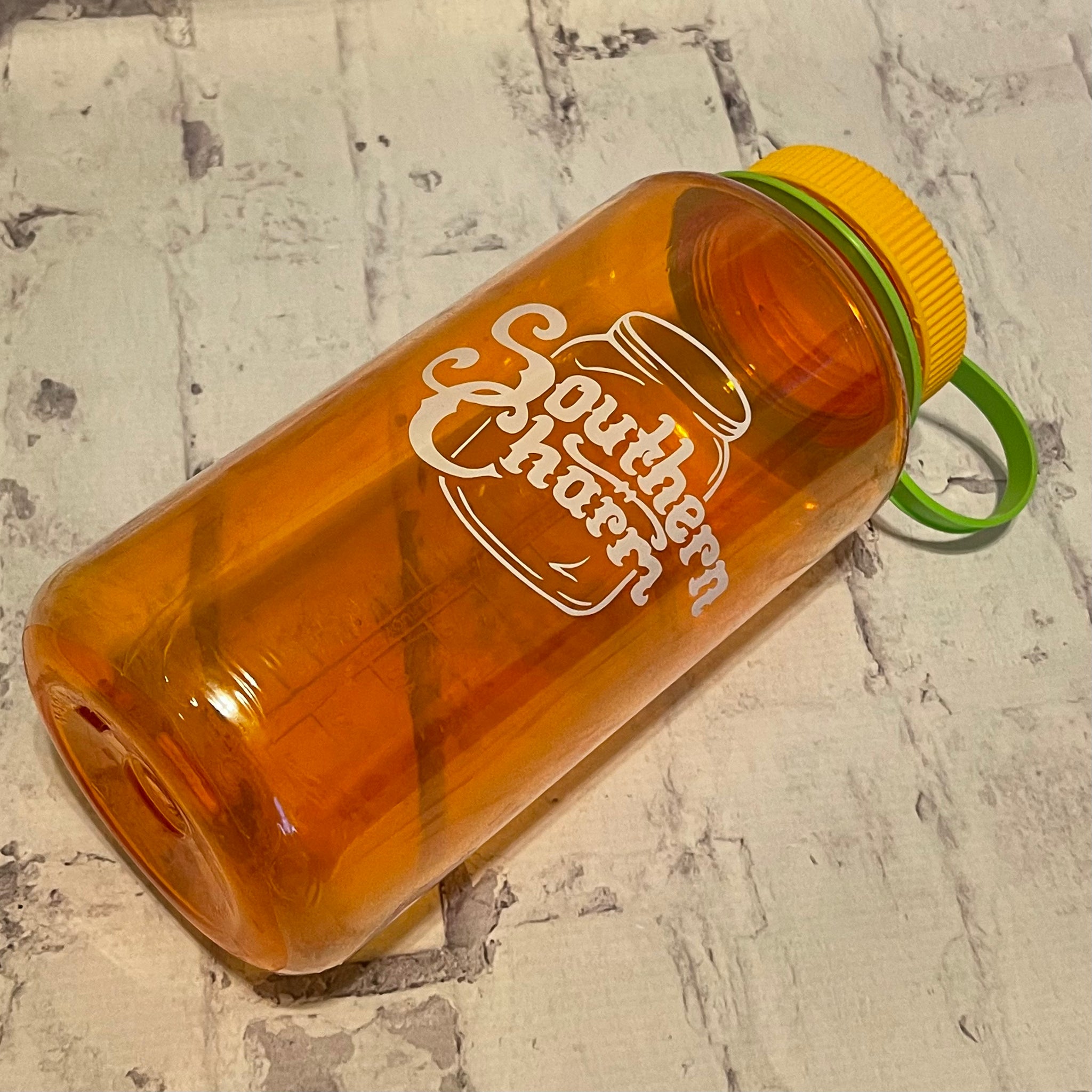 Southern Charm Original Logo Water Bottle - Orange – Southern Charm Shop  The Charm